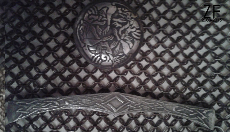 Украшение средневекового оружия методом травления травление гарды и навершия меча